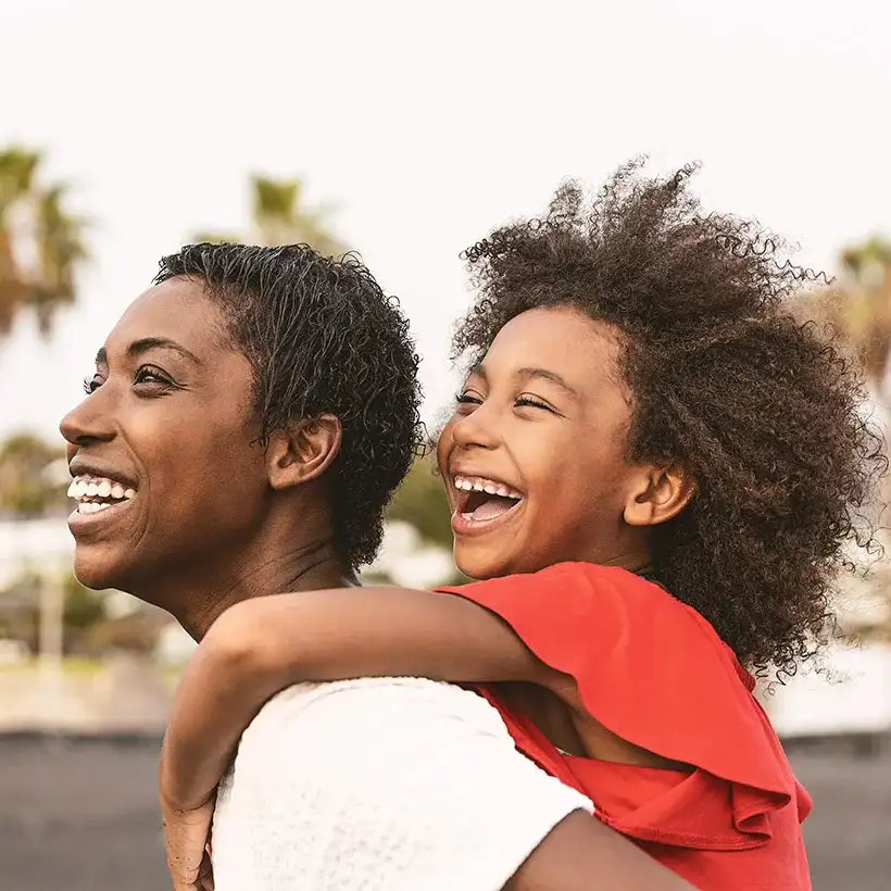 Mother and child smiling